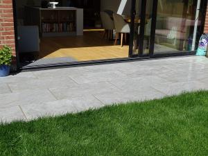 Pavestone Porcelain Patio Paving Domomite Moon Light Grey with Azpects Pointing and Turf Laying