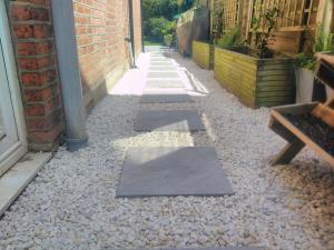 Oilcanfinish Landscaping Pavestone Porcelain Stepping Stones and Cotswold Chippings