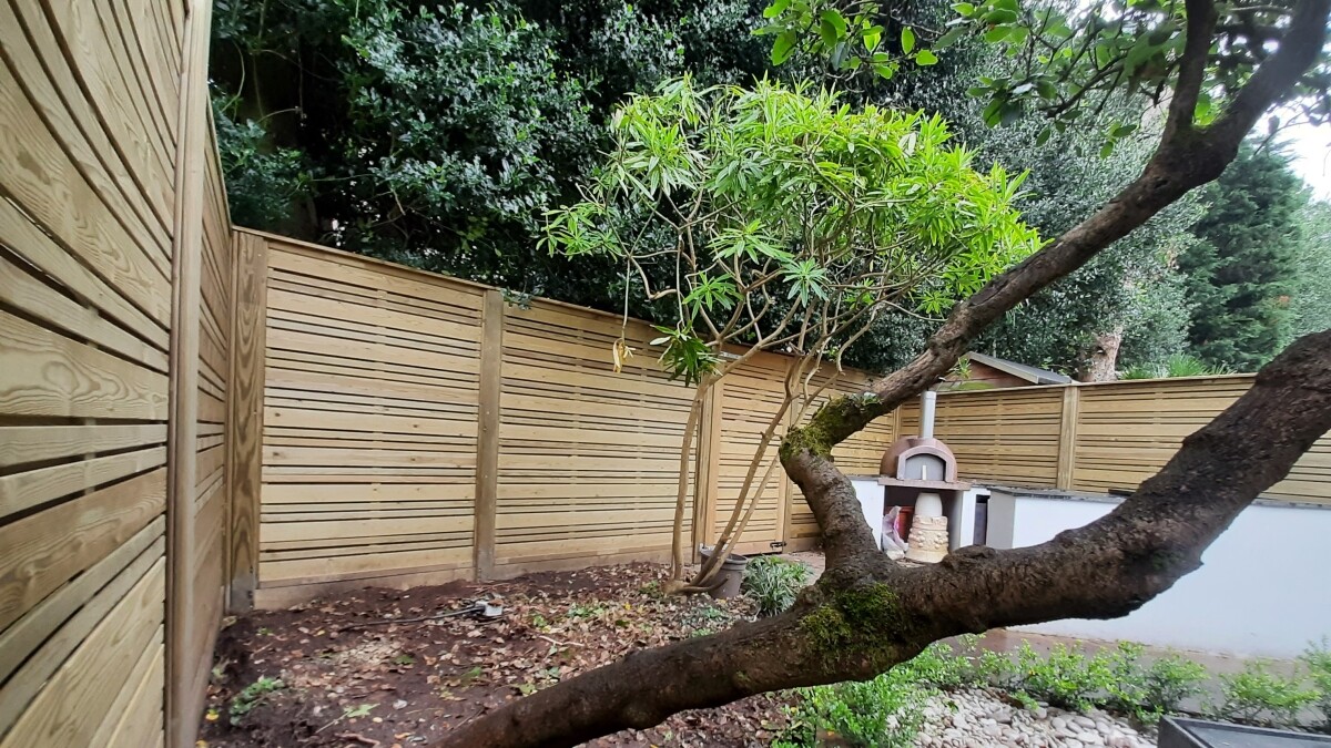 Image of a mature residential garden installation of Jacksons Fencing Urban Panels