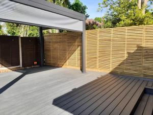 Trex Composite Decking Installation in Ewell KT7 with Slat Fencing Oilcanfinish