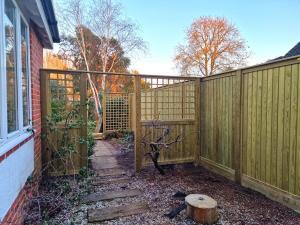 Image of a Garden Partition with Jacksons Fence Jacksons Fencing Trellis and Fence Installed in Wimbledon SW19